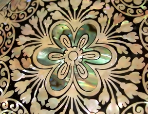 This macro photo of the inlaid top of a lacquered box, which would be considered a decorative collectible, was taken by photographer Dora Pete from Nagytarcsa, Hungary. 